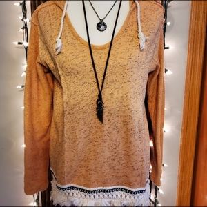 Boho hoodie with frilly design.